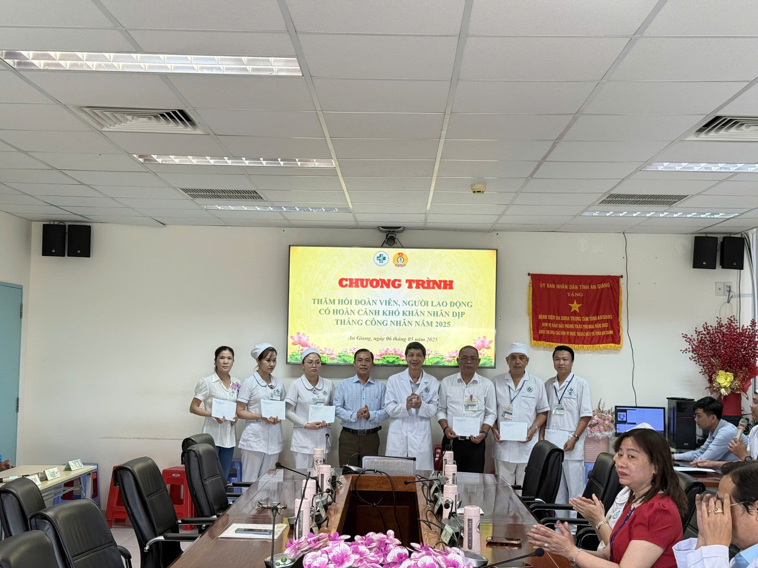 A group of people in white uniforms standing in a room

AI-generated content may be incorrect.